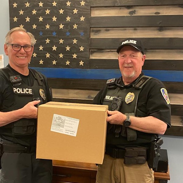 Argo Police answer a different call, assisting Argo food pantry delivering pre-packaged Food Boxes to residents in the Argo Community.  We're